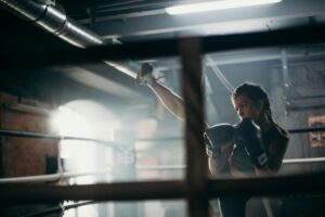 Young girl in boxing ring